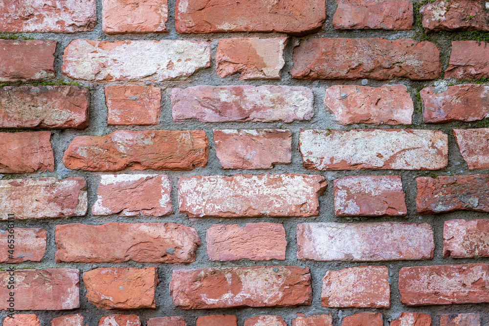 The brick wall is red. Old brickwork. Textured background