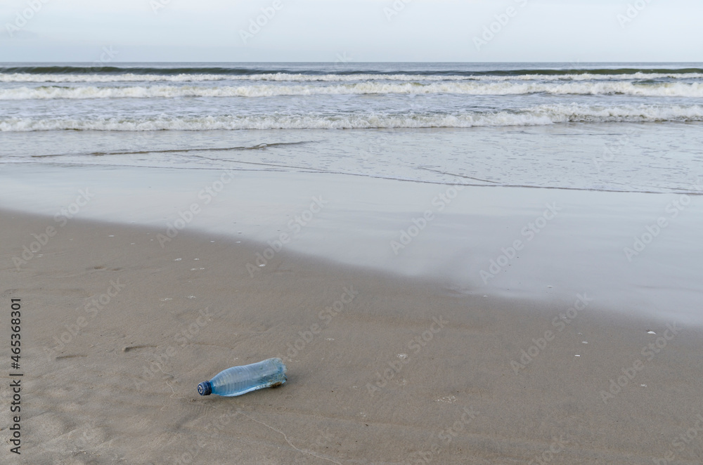 plastic bottle rubbish dropped on the beach plastic bottle rubbish dropped on the beach