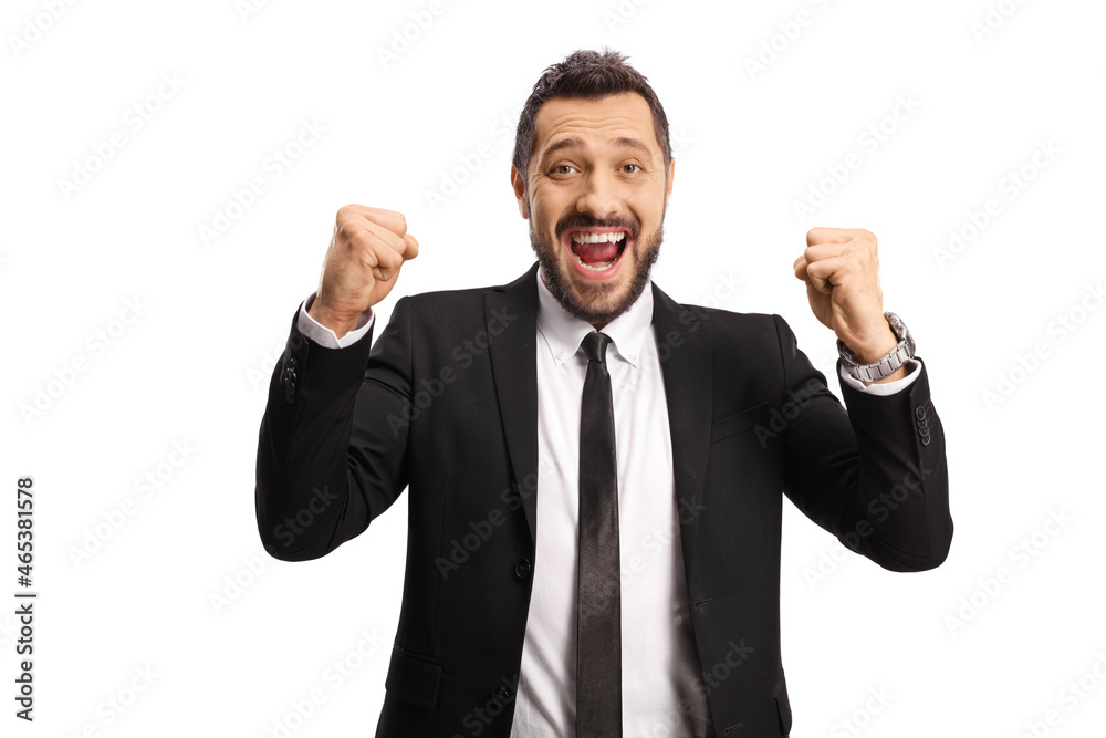 Young businessman gesturing happiness and looking at camera Young businessman gesturing happiness and looking at camera