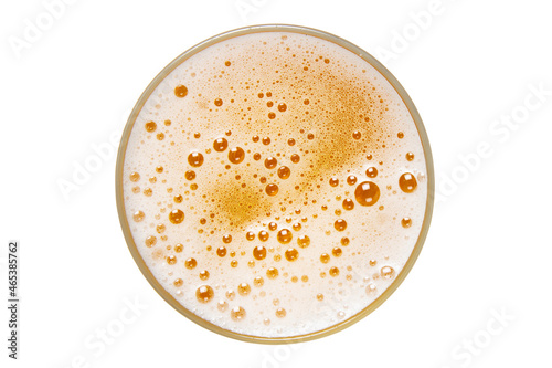 Beer in glass. Beer foam isolated on white background. View from above.