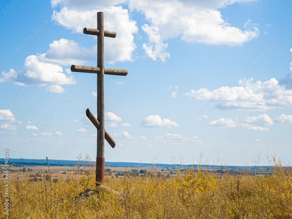wooden cross on a hill