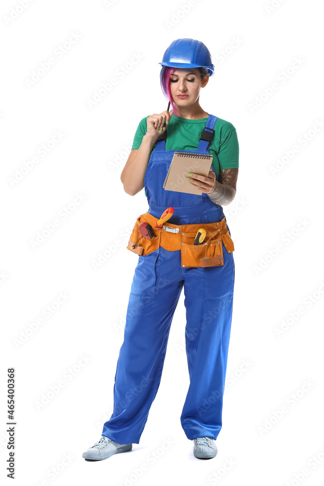 Thoughtful female electrician with notebook on white background Thoughtful female electrician with notebook on white background