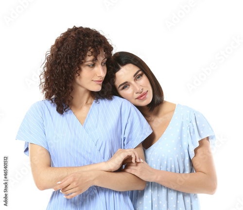 Beautiful sisters hugging o...