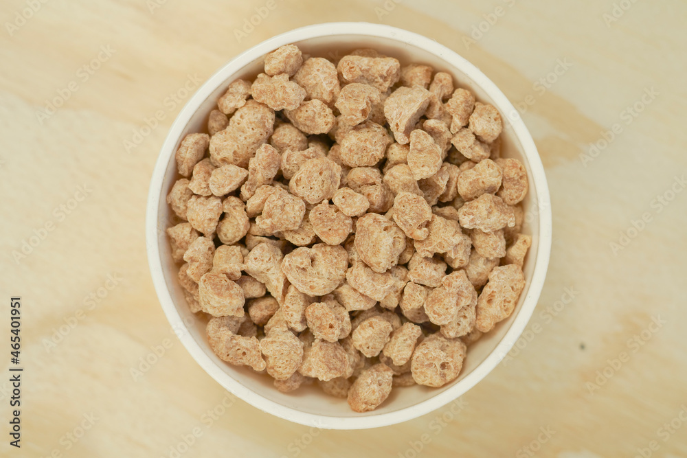Closeup of textured soy protein. Textured vegetable protein.
Soy meat for a vegan diet Closeup of textured soy protein. Textured vegetable protein.
Soy meat for a vegan diet