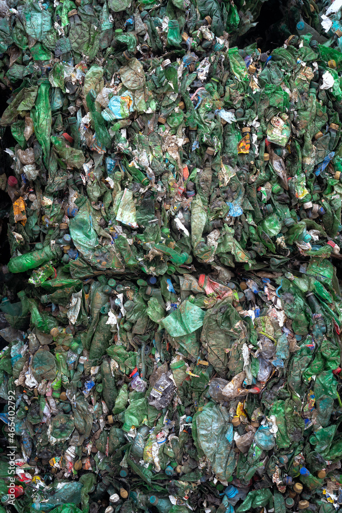 Foto de Bundle of pressed plastic bottles prepared for a garbage ...