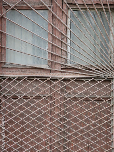 old window with grill