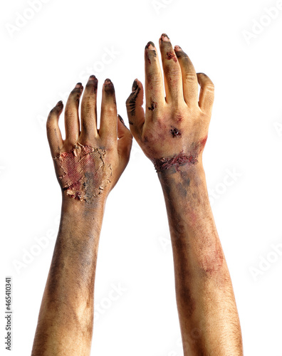 Hands of zombie on white ba...