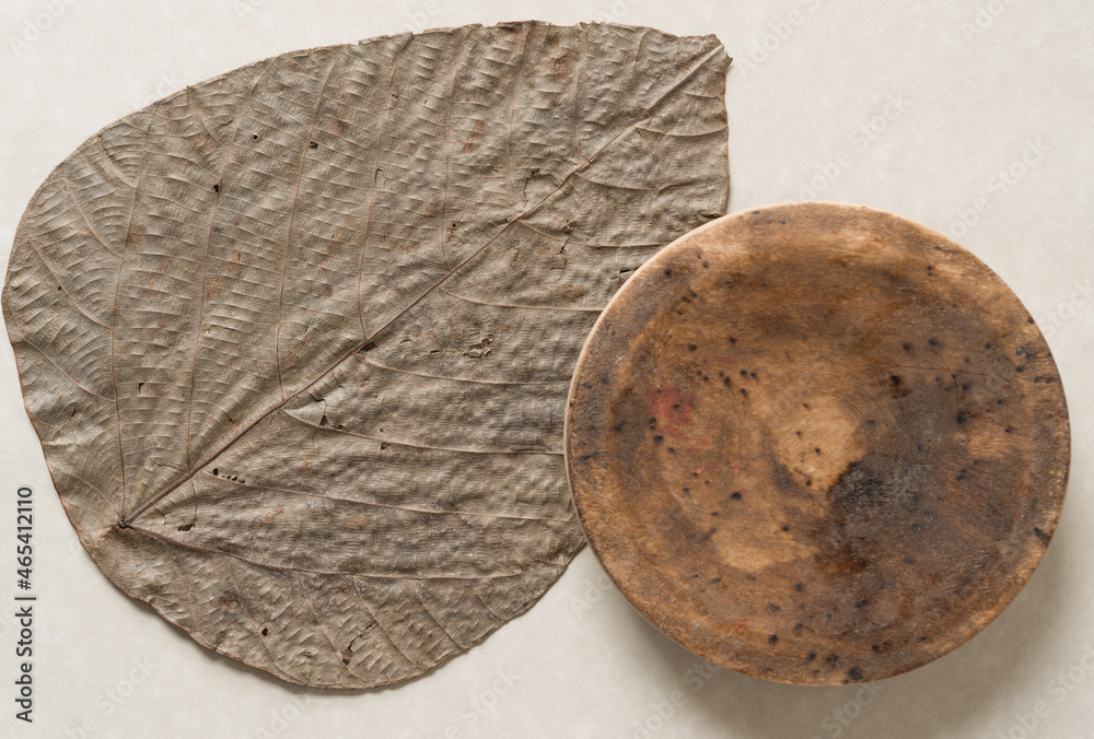 leaf with wooden object leaf with wooden object