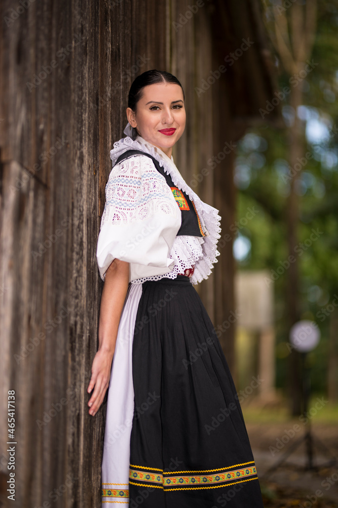 Young beautiful slovak woman in traditional dress. Slovak folklore Young beautiful slovak woman in traditional dress. Slovak folklore