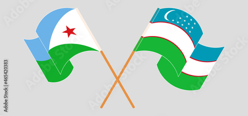 Crossed and waving flags of Djibouti and Uzbekistan