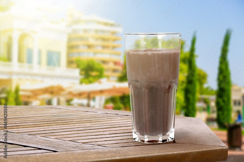 Latte coffee in a beautiful cup, foamy coffee and milk drink in a transparent glass cup. Latte coffee in a beautiful cup, foamy coffee and milk drink in a transparent glass cup.