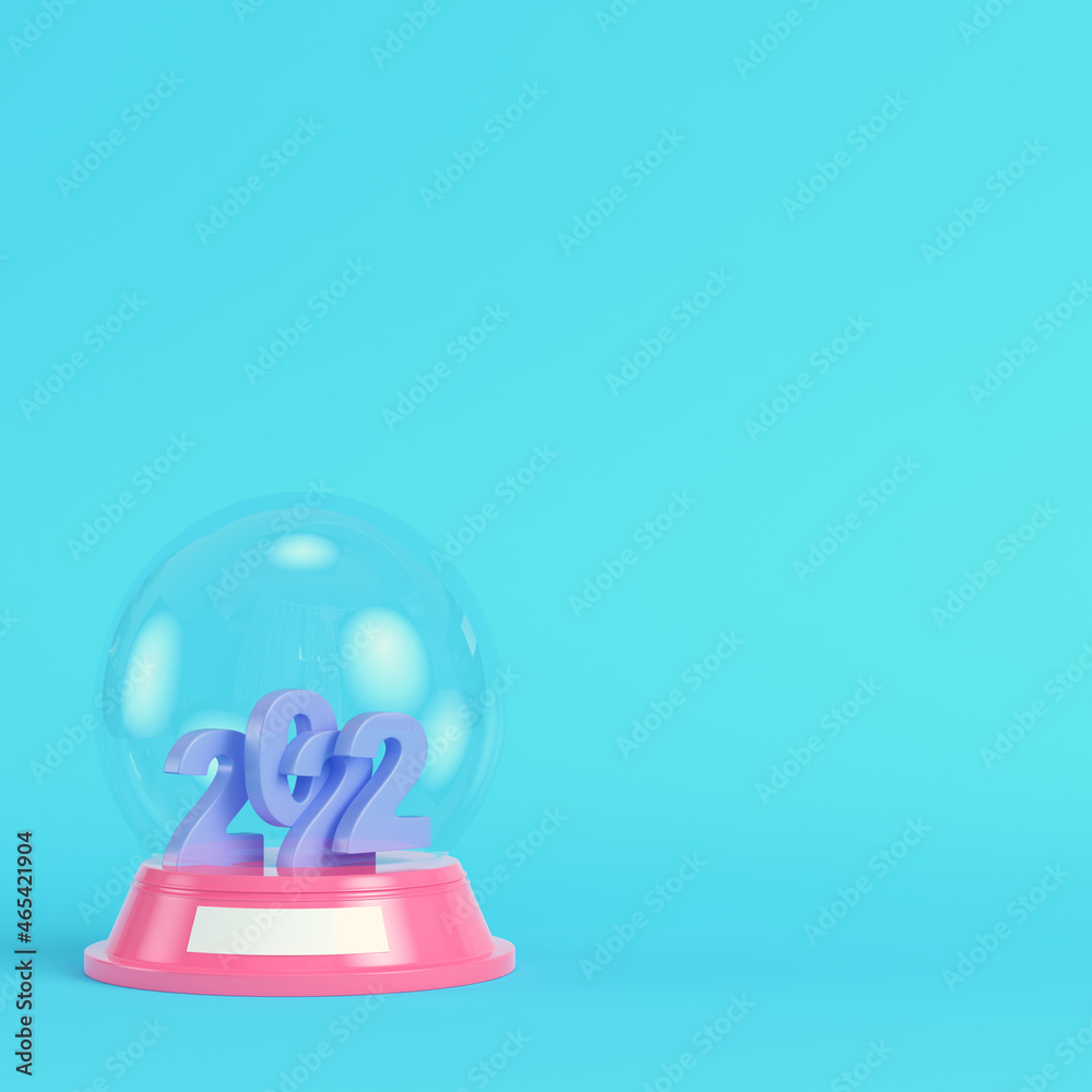 Pink snow globe with christmas bauble and 2022 figures on bright blue background in pastel colors Pink snow globe with christmas bauble and 2022 figures on bright blue background in pastel colors