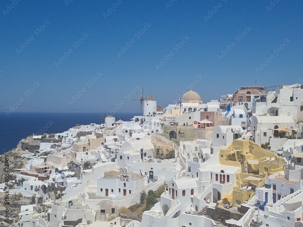 Beautiful Santorini island landscape with sea, sky and clouds. Oia town, Greece landmark in summer