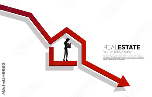 silhouette of losing job man in home icon in falling down arrow. Concept for depression of unemployment people.