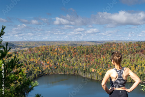 Above Bean and Bear Lakes in Minnesota, during the fall - woman posing