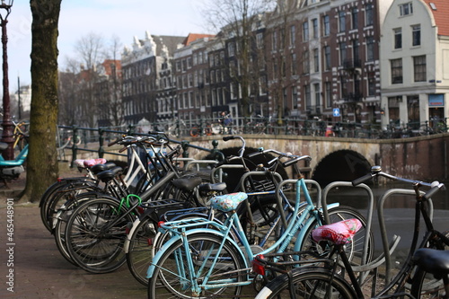 a lot of bicycle parked on the street in amsterdam