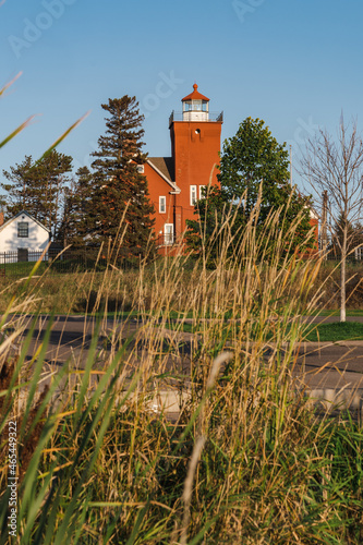 Two Harbors, Minnesota  lighthouse, with grassy reeds in foreground photo