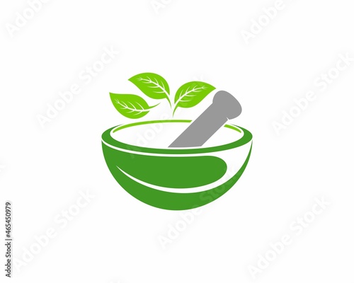 Mortar and pestle with nature green leaf