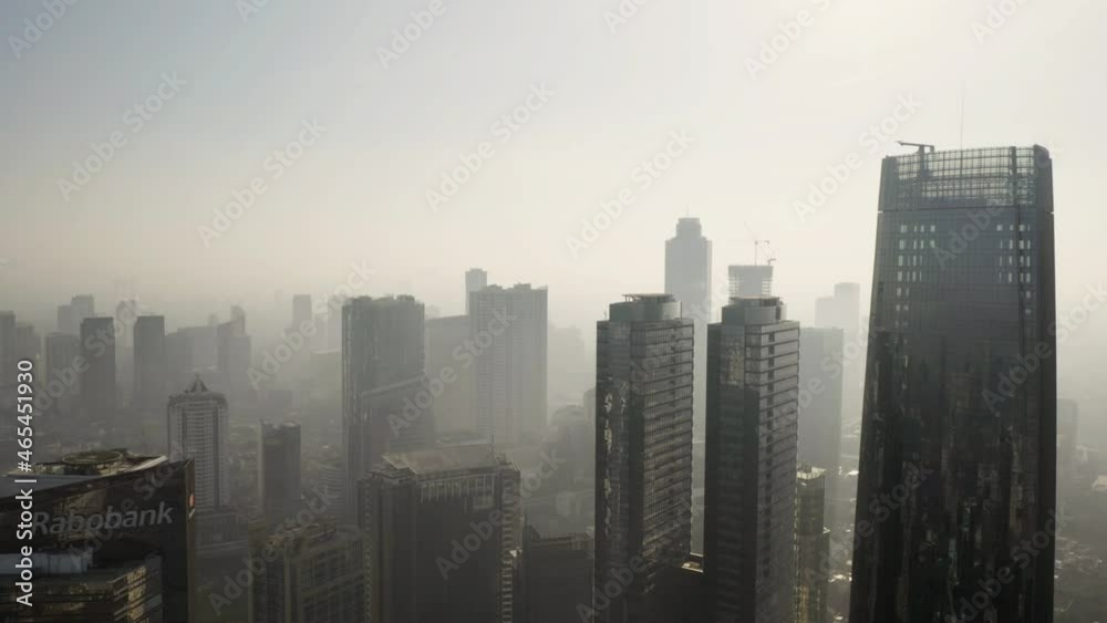 Aerial view of dense air pollution around Jakarta city Aerial view of dense air pollution around Jakarta city