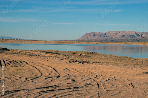 ORV tracks in sand dunes at sunset at Elephant Butte State Park near Truth or Consequences, New Mexico