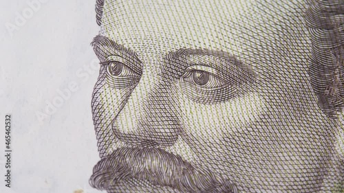 Face of writer and ukrainian poet Ivan Franko on money paper banknote. Concept of investment, success, financial prospects. National currency of Ukraine hryvnia UAH, 20 hryvna bill or hryvnya photo