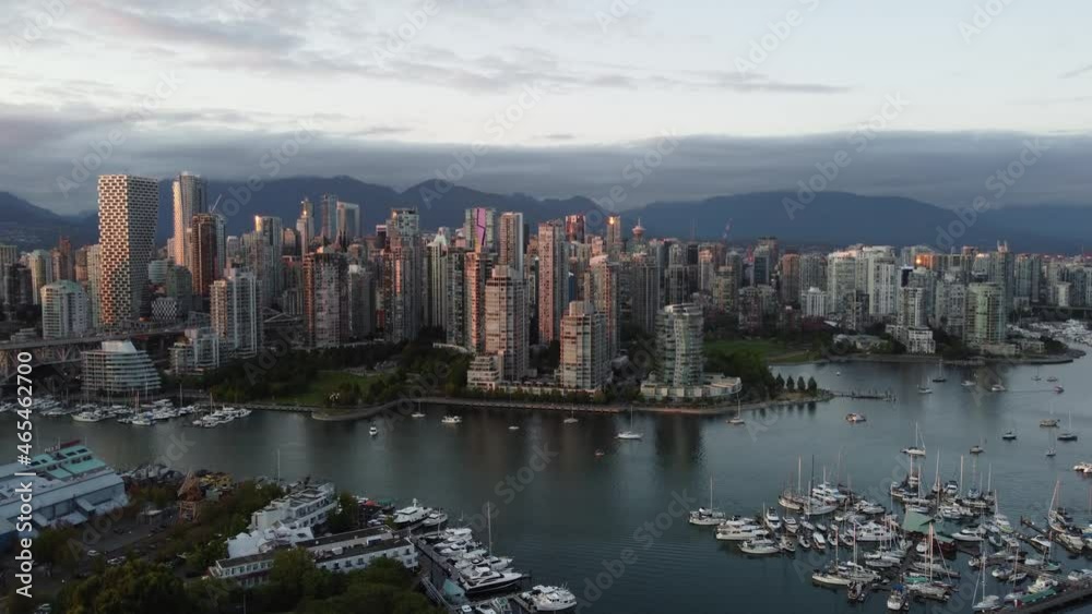 Aerial view of Vancouver downtown skyscrapers, marina and creek on a sunset Aerial view of Vancouver downtown skyscrapers, marina and creek on a sunset
