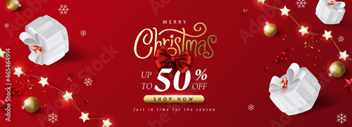 Merry Christmas sale promotion poster banner with gift box and festive decoration on red background