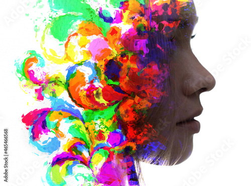 A creative portrait of a woman combined with abstract colorful shapes in a paintography technique.
