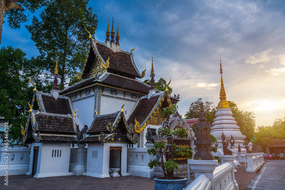 Wat Chedi Luang is a Buddhist temple in the historic centre and is a Buddhist temple is a major tourist attraction in Chiang Mai,Thailand.at twilight time blue sky clouds sunset background.