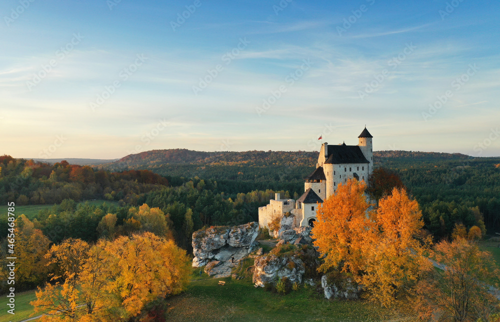 Aerial shot of Jura Krakowsko-Czestochowska during autumn - Bobolice castle ruins