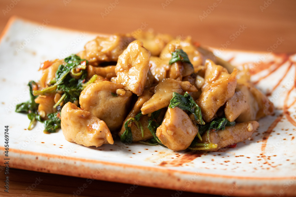 Stir-fried fish balls with basil, handmade in traditional Thai style Stir-fried fish balls with basil, handmade in traditional Thai style