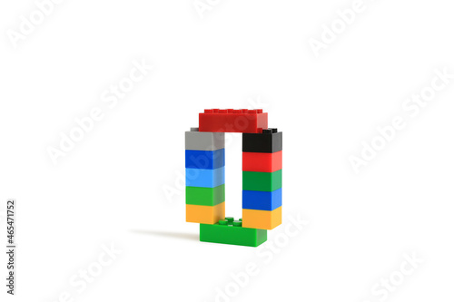 Arabic number symbol 0 from colorful plastic brick block constructor isolated on white background. Image with Clipping path photo