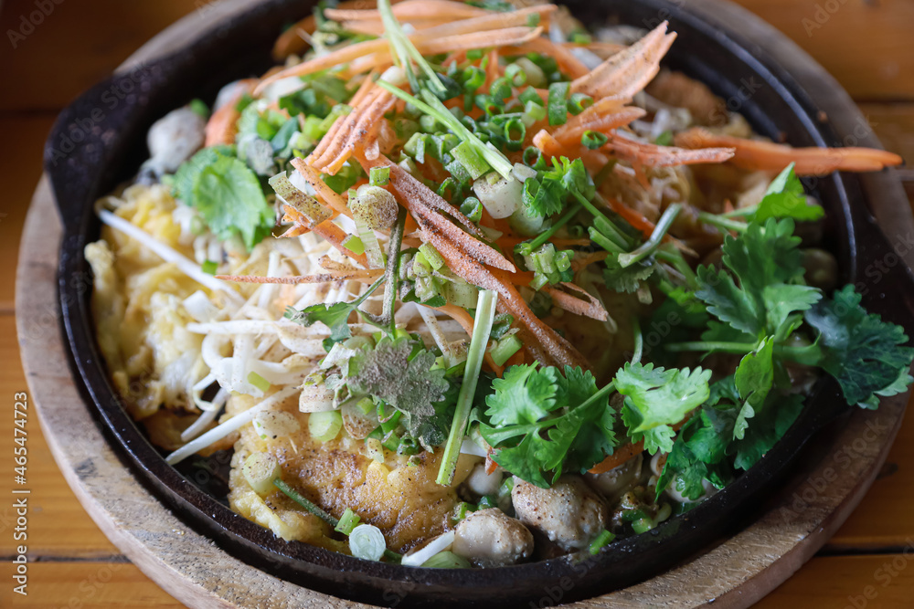 Hot pot oyster omelette in hot pan Hot pot oyster omelette in hot pan
