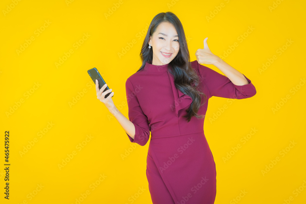 Portrait beautiful young asian woman smile with smart mobile phone Portrait beautiful young asian woman smile with smart mobile phone