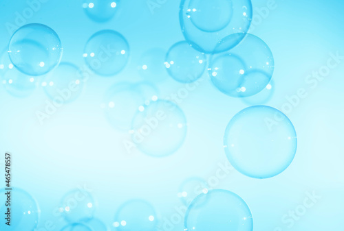 Beautiful Transparent Blue Soap Bubbles on White Background