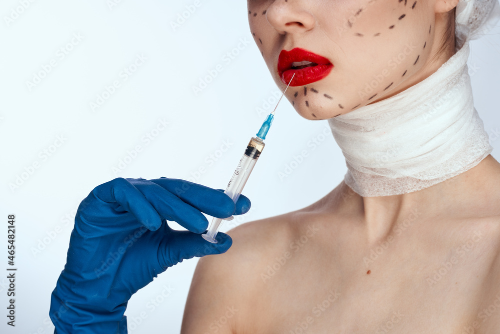 beautiful woman Red lips plastic surgery operation bare shoulders close-up beautiful woman Red lips plastic surgery operation bare shoulders close-up