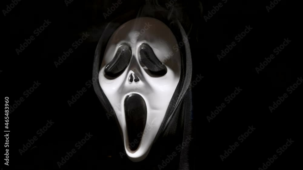 The scary and spooky face inside the dark room during the halloween season in Estonia The scary and spooky face inside the dark room during the halloween season in Estonia