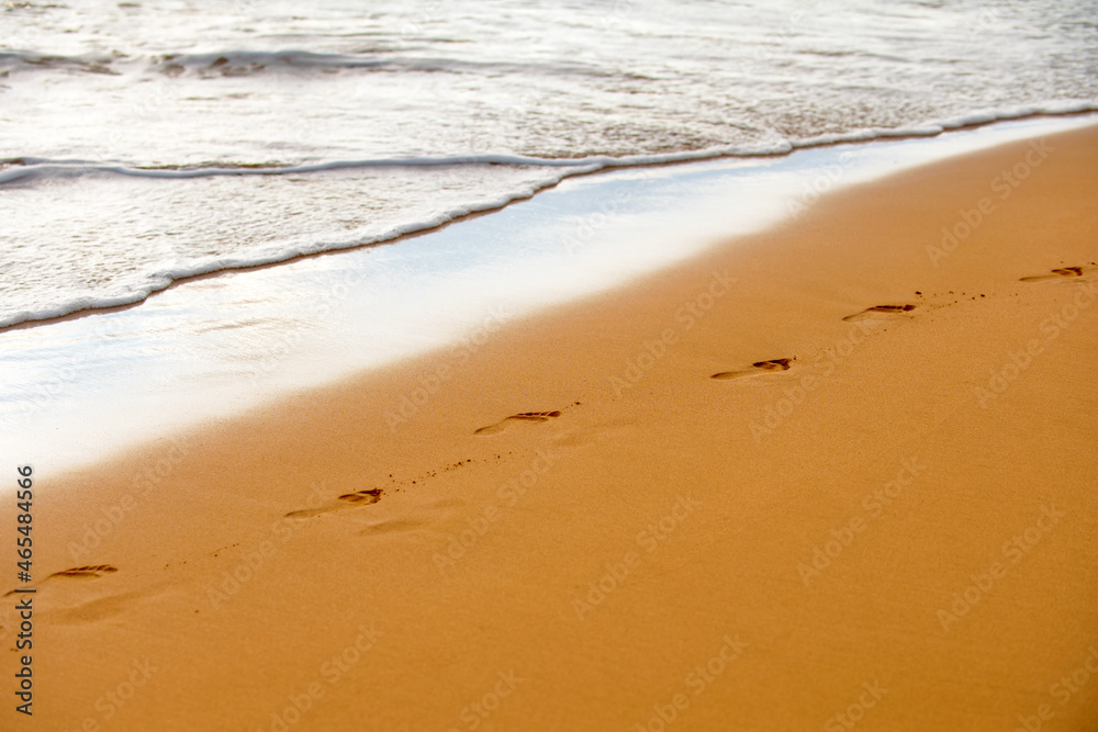 Footprints on the beach. Summer vacation background. Footprints on the beach. Summer vacation background.