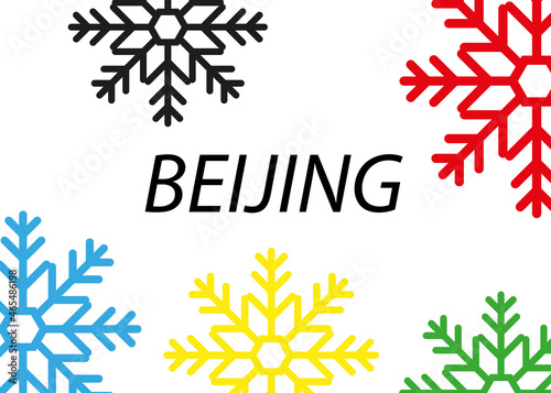 BEIJING black inscription on a white background with colored snowflakes.