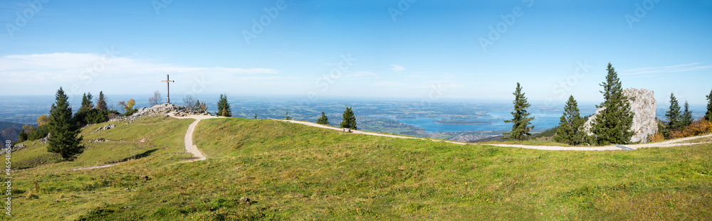 lookout point Kampenwand, hiking area chiemgau with mountain cross and view to lake Chiemsee