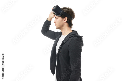 Man taking off VR headset