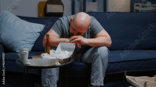 Obraz na plátně Hopeless depressed man overwhelmed by problems crying feeling loneliness, chronic fatigue upset suffering from migraine anxiety