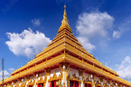 Golden ancient pagoda of Phra Mahathat Kaen Nakhon (Wat Nong Wang) temple, Thai traditional religious histoty travel attraction in Khon Kaen, Thailand. photo