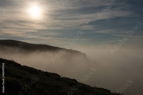 sunset with fog at Ursa Beach in Sintra, Portugal.