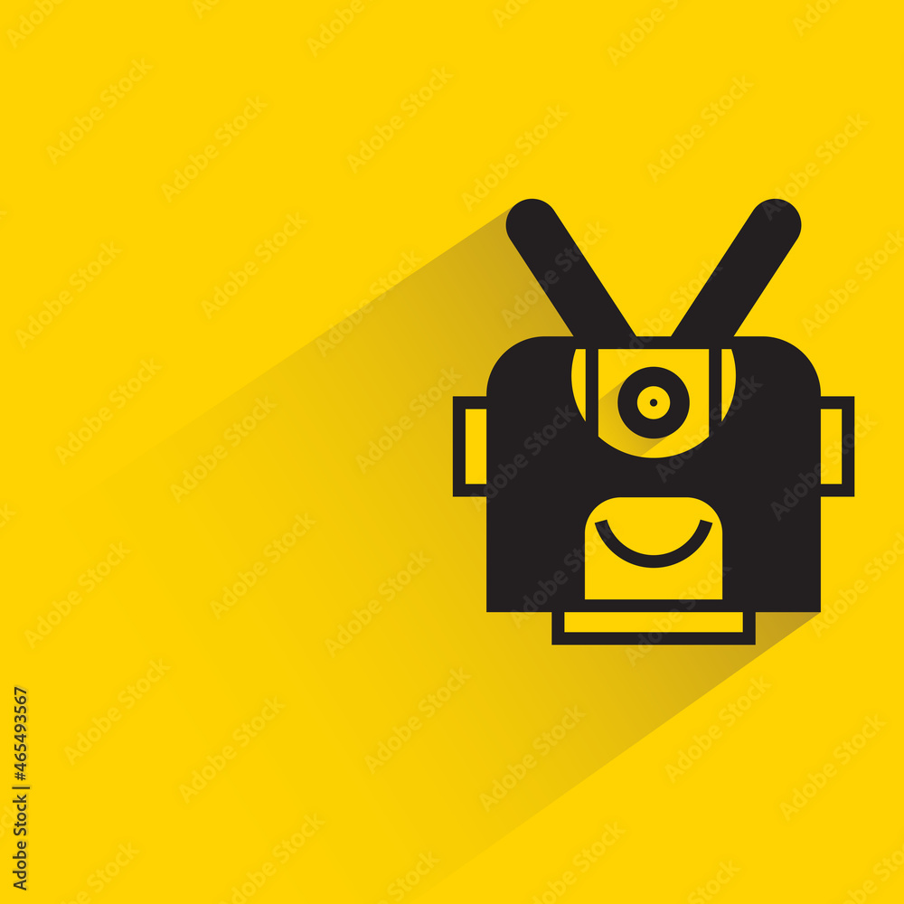 robot character with drop shadow on yellow background