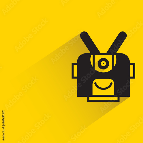 robot character with drop shadow on yellow background