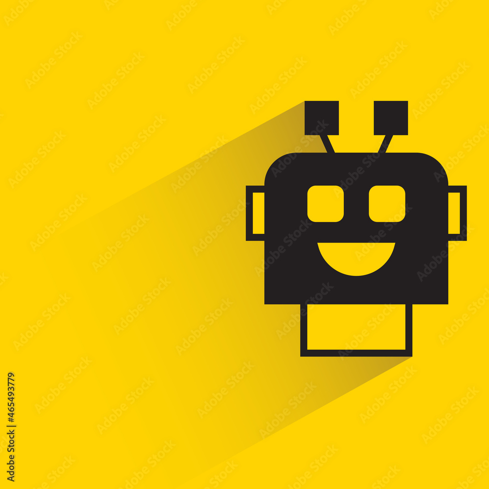 robot head with drop shadow on yellow background robot head with drop shadow on yellow background
