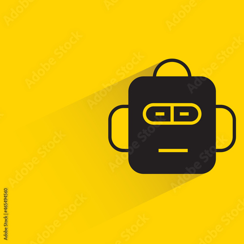 robot head with drop shadow on yellow background