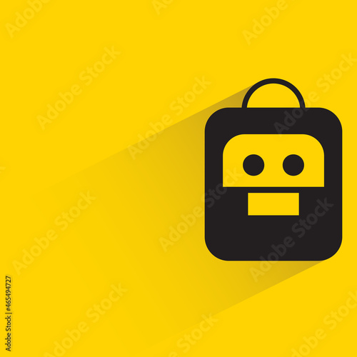 robot head with drop shadow on yellow background