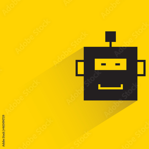 robot head with drop shadow on yellow background